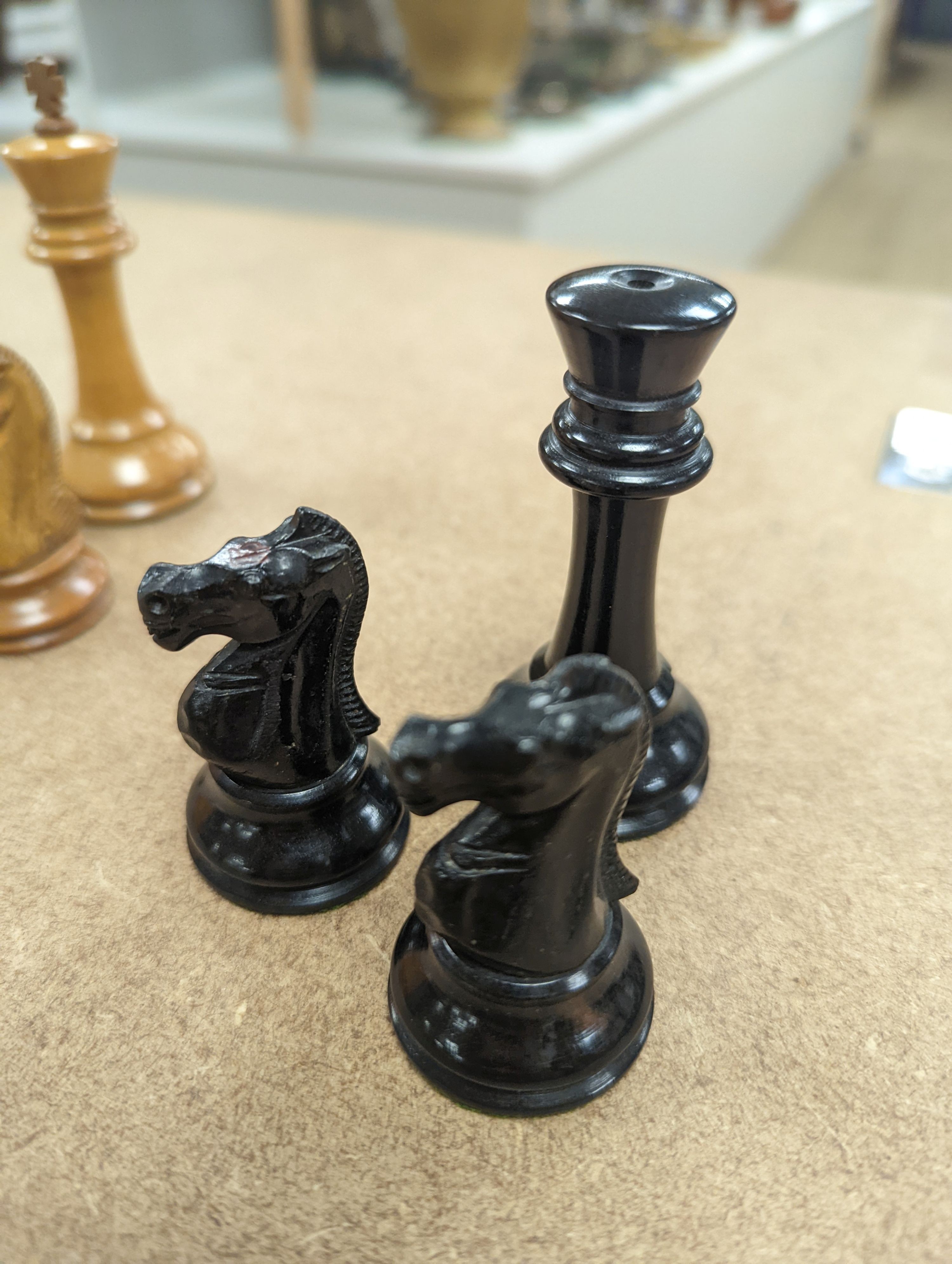 A Staunton chess set, some associate pieces and a miniature chess set. King height - 9cm